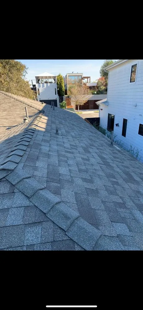 Slide of I Can Roofing