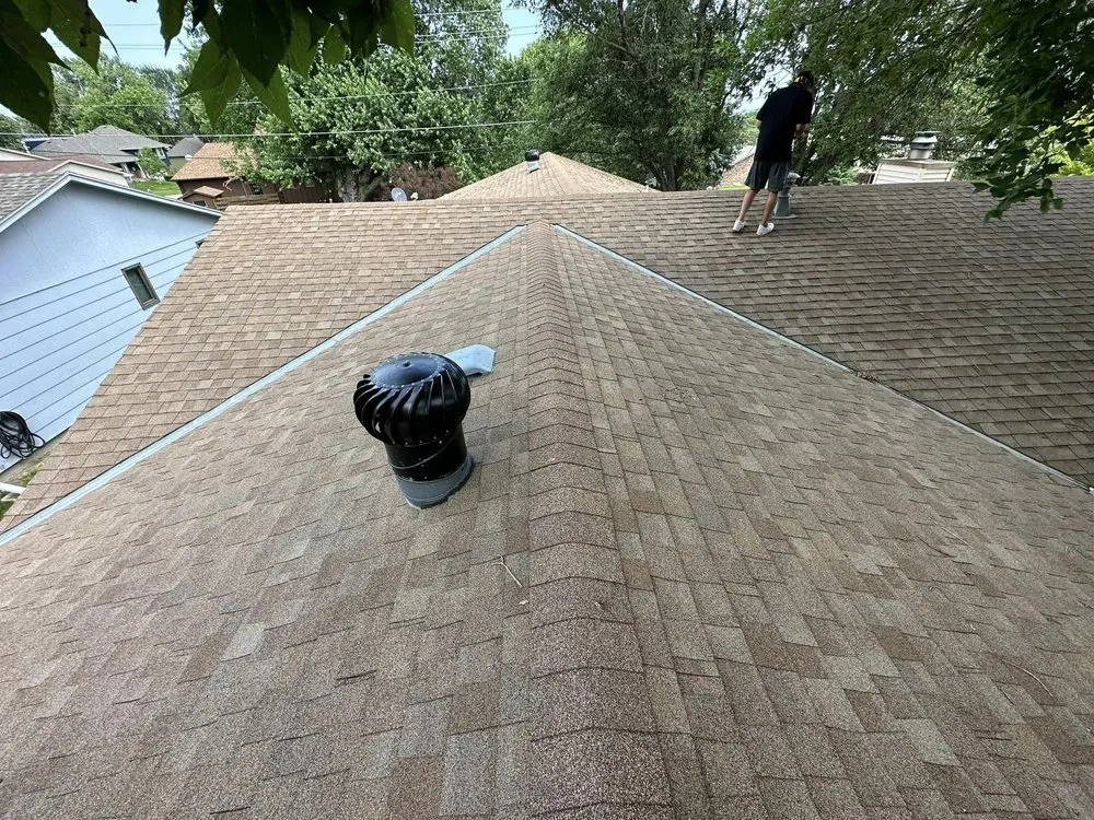 Slide of Ibex Roofing