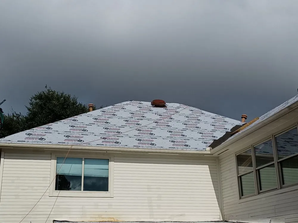 Slide of Ibrahim Roofer