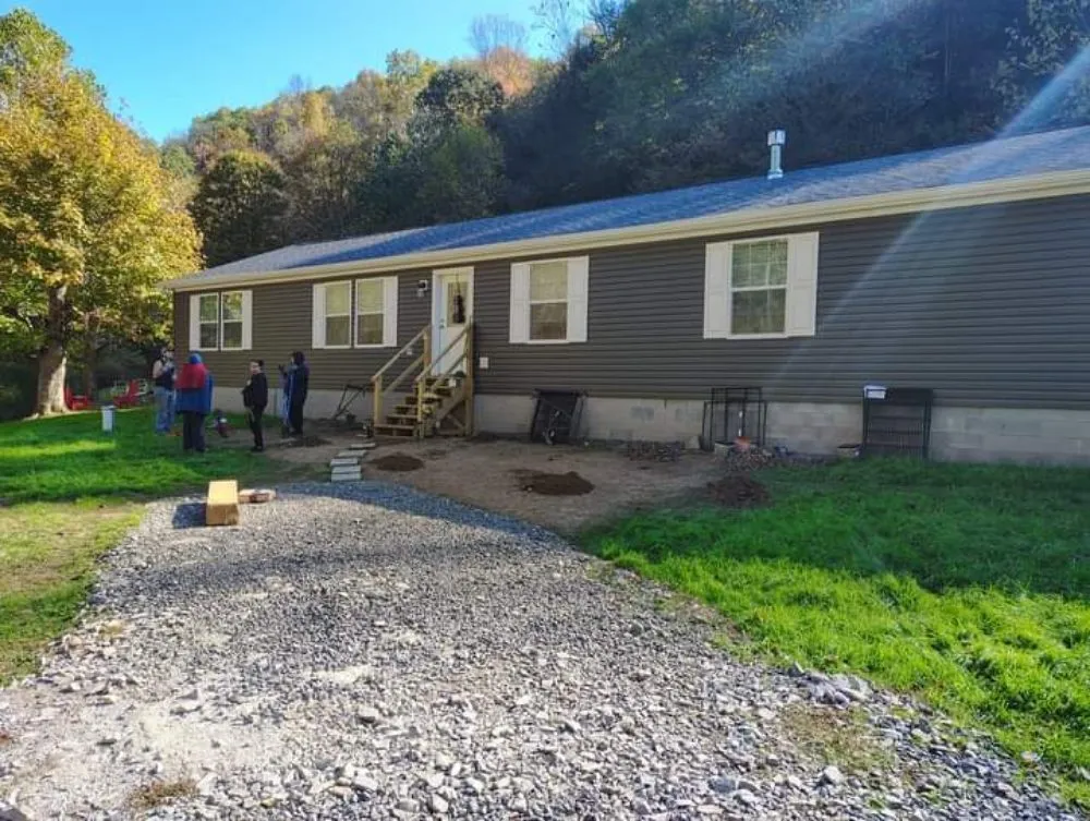 Expert flat roof repair after storm damage across Fairview, WV - Ideal Construction