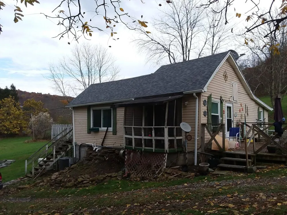 Professional metal roofing installation for homes in Fairview, WV by Ideal Construction