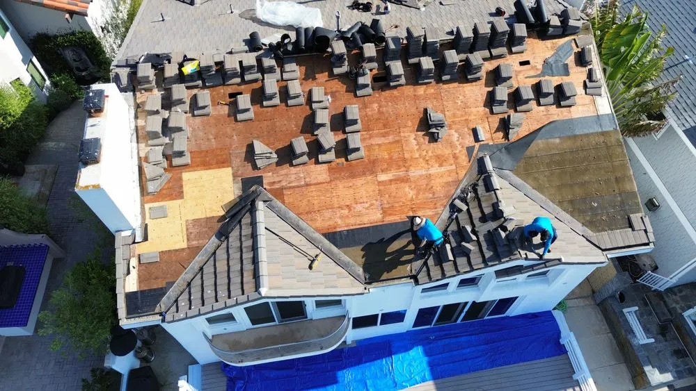 Slide of iHeart Roofing