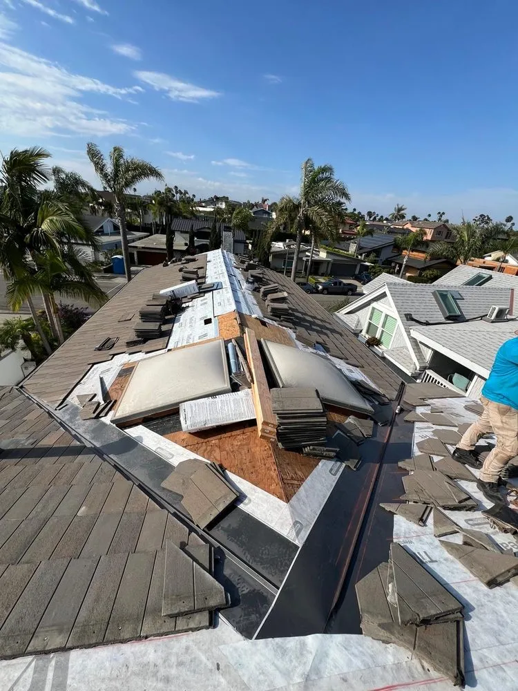 Slide of iHeart Roofing