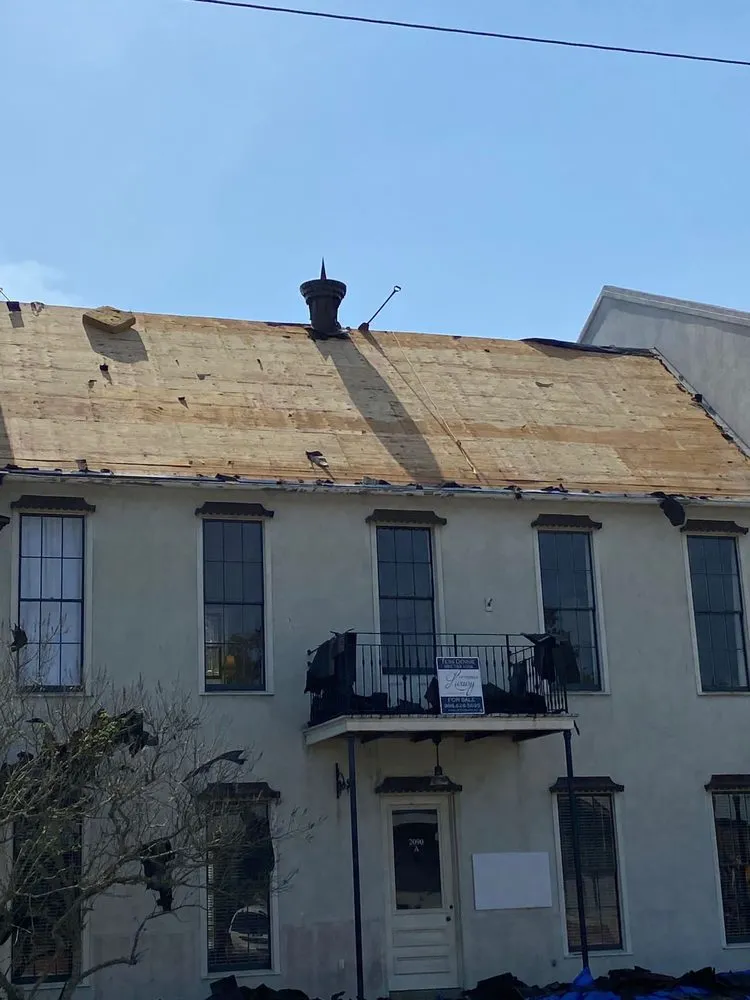 Slide of Ik Roofing & Reconstruccion