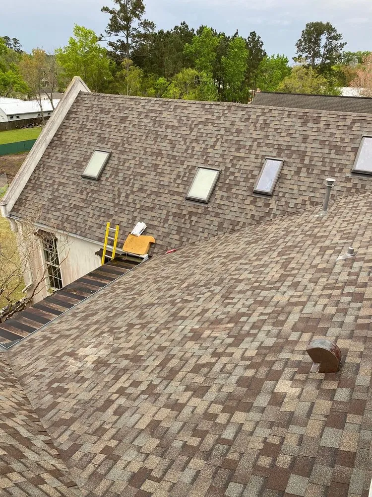 Slide of Ik Roofing & Reconstruccion