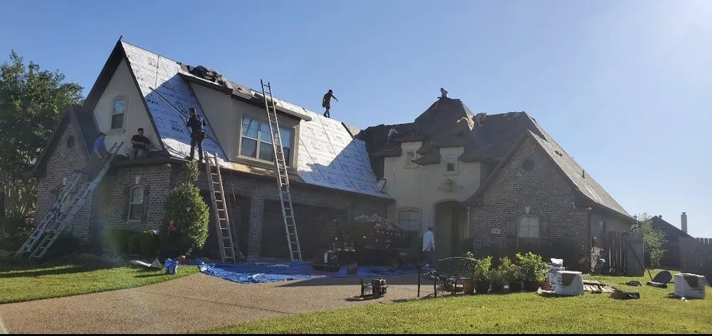 Slide of Illusion's Roofing