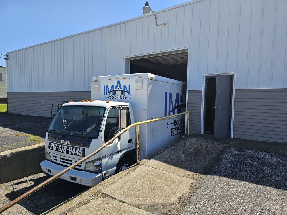 Slide of IMAN Roofing