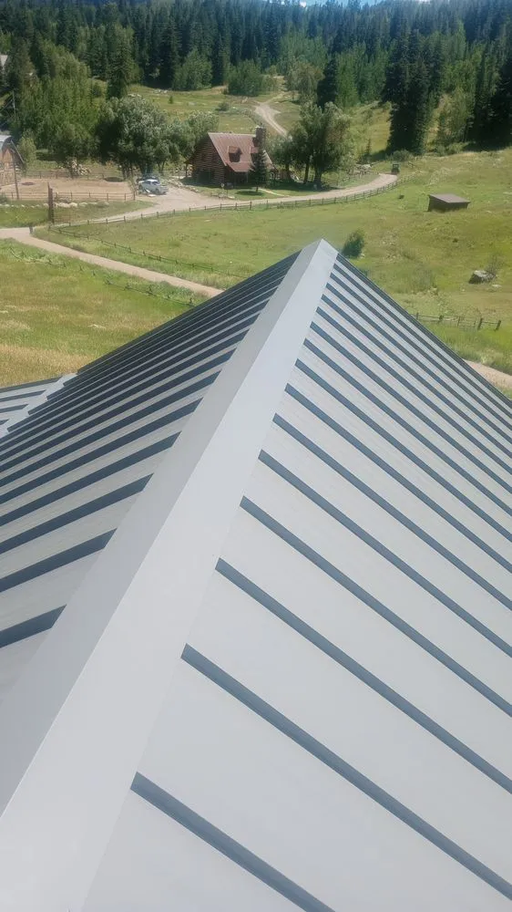 Slide of IMG Roofing