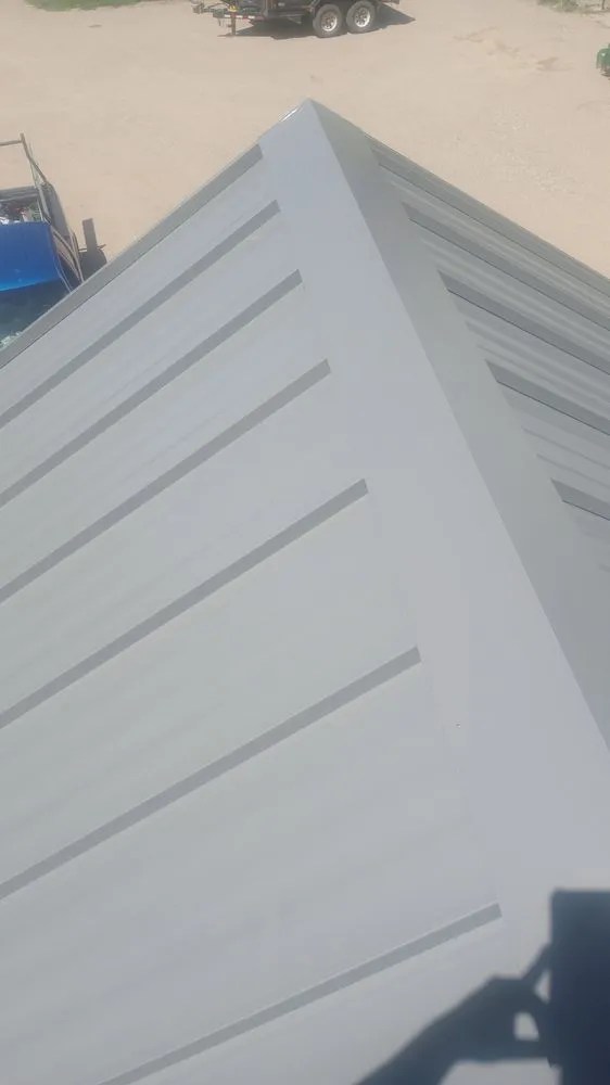 Slide of IMG Roofing