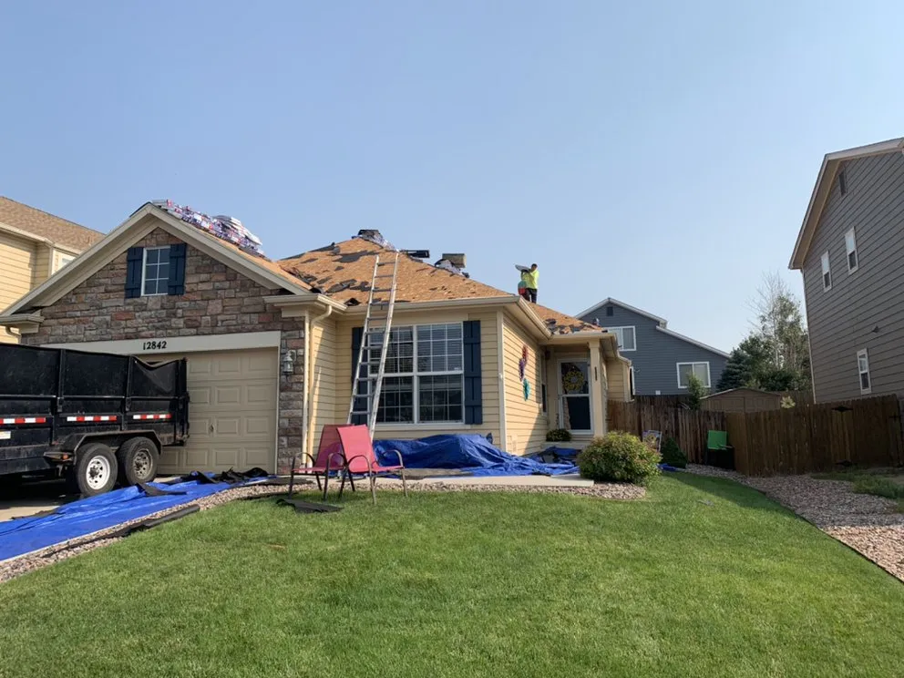 Slide of IMJ Roofing