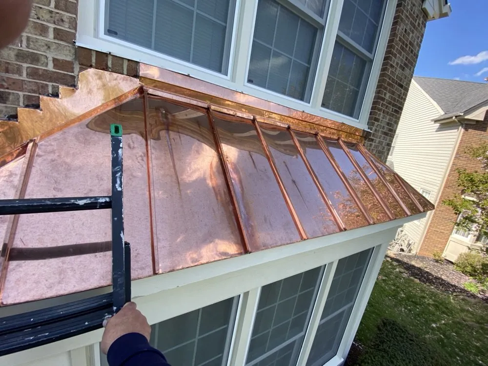 Slide of Impact Roofing & Construction