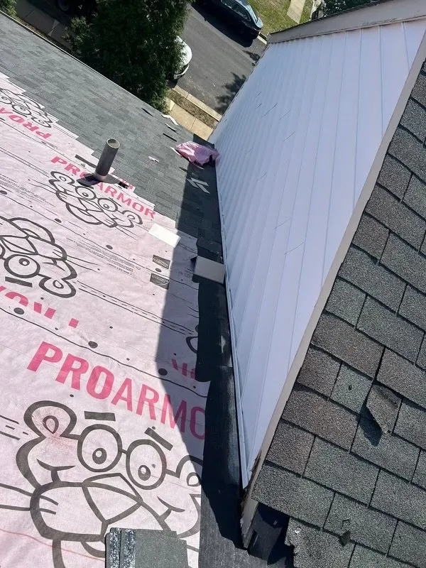 Slide of Impact Roofing & Renovations