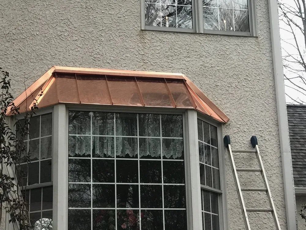 Slide of Impriano Roofing & Siding