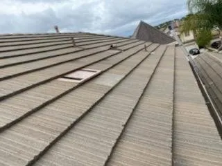 Slide of Industrious Roofing