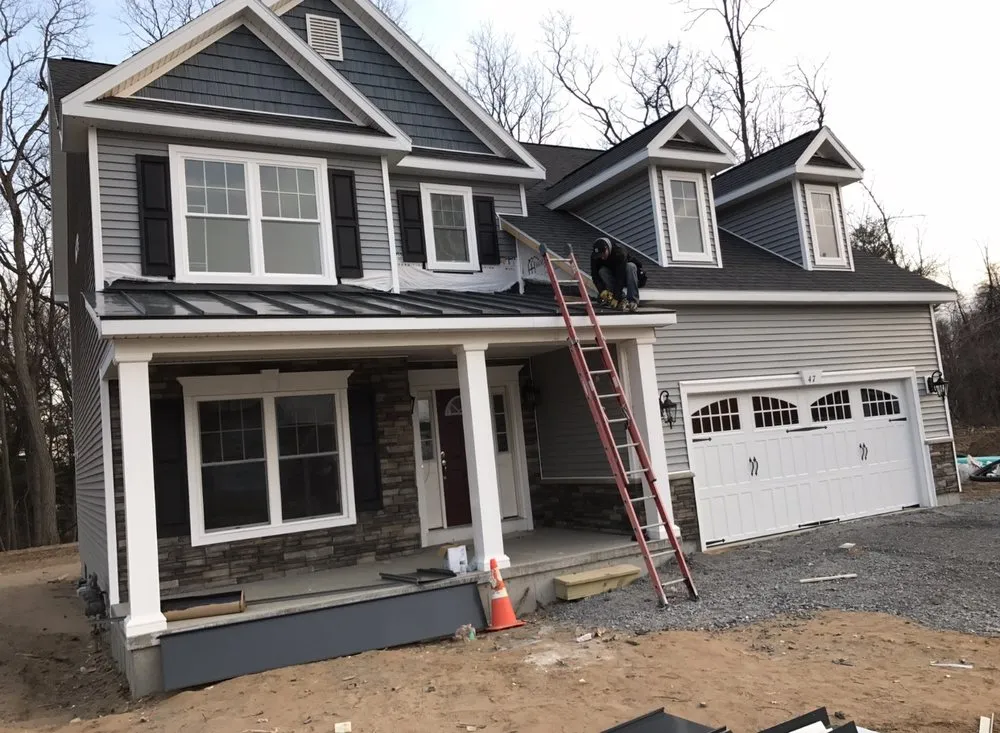 Slide of Infinite Roofing and Construction