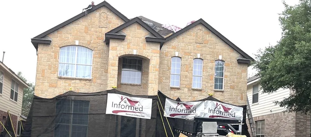 Slide of Informed Roofing & Restoration