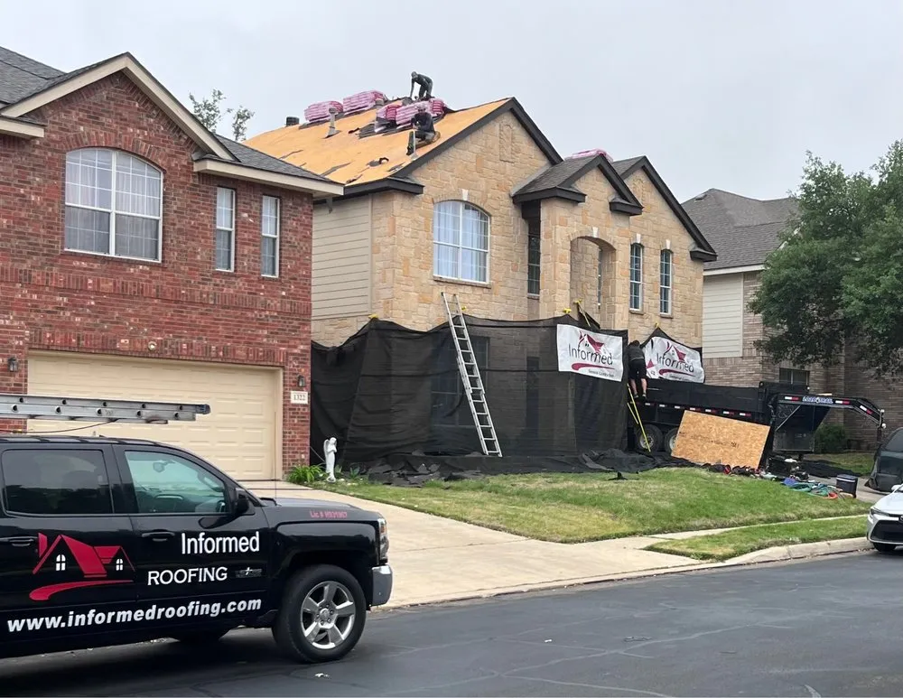 Slide of Informed Roofing & Restoration