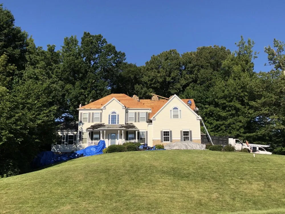Local shingle roofing service after storm damage in Faulkner, MD by Innovative Construction Services