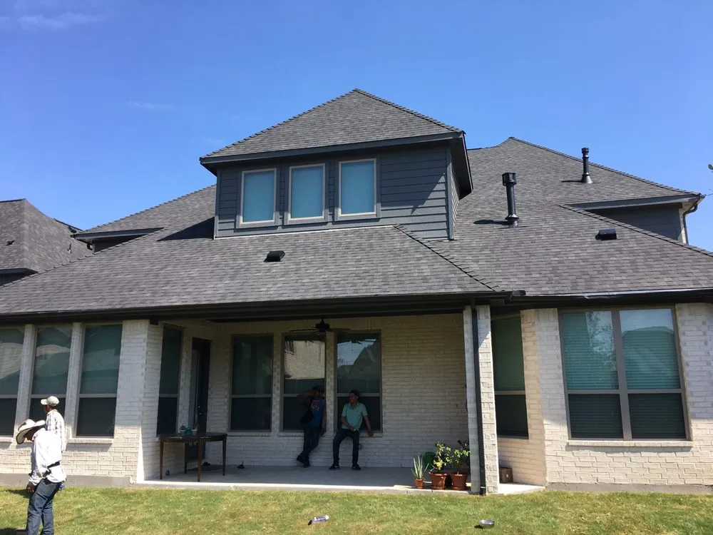 Slide of Inspiration Roofing & Construction