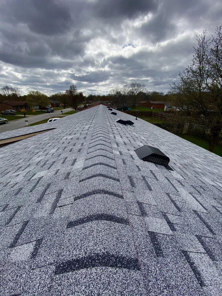 Slide of INT Roofing & Construction