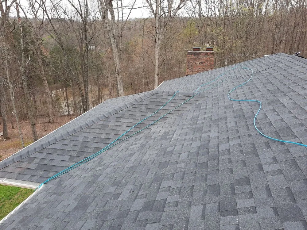 Slide of INT Roofing & Construction