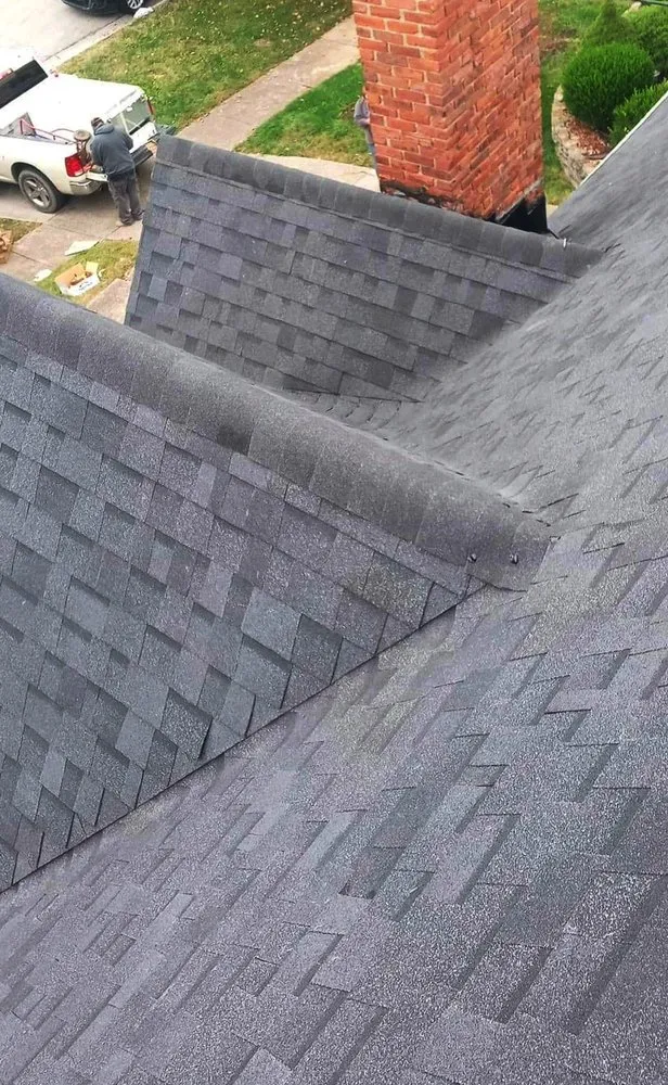 Slide of INT Roofing & Construction