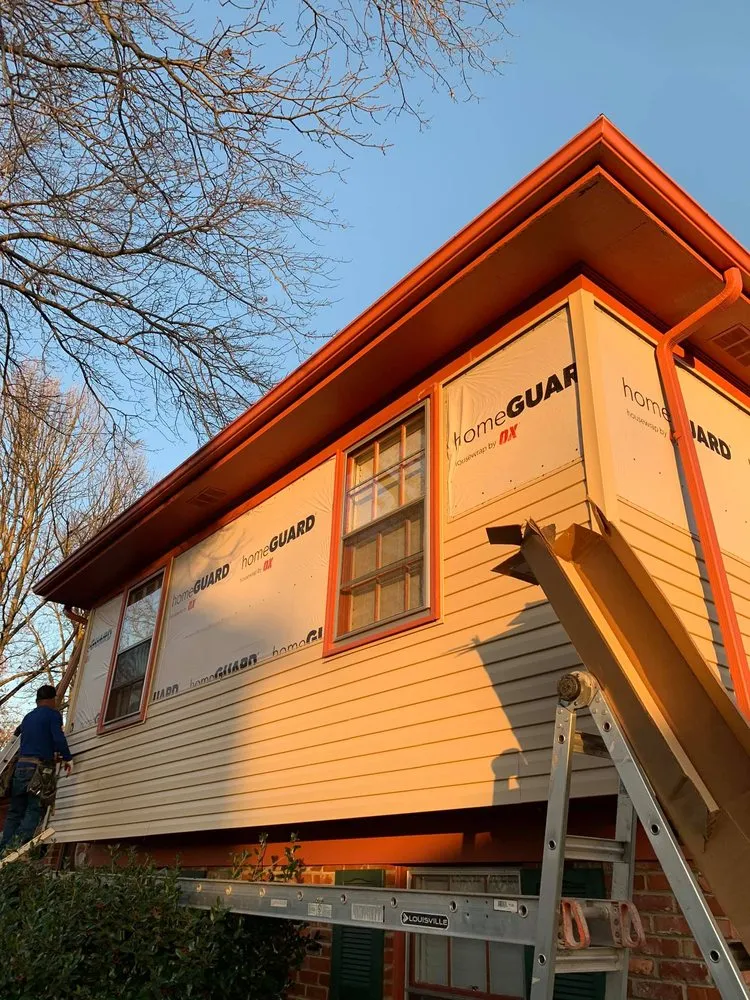 Slide of INT Roofing & Construction