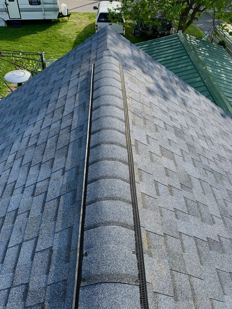 Slide of INT Roofing & Construction