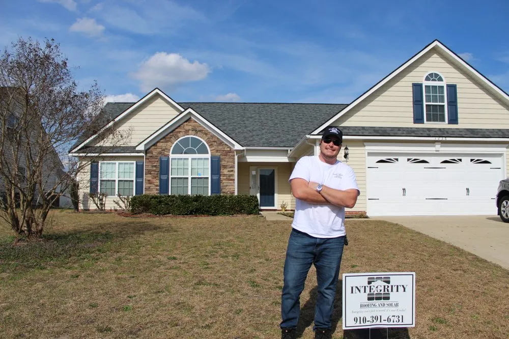 Slide of Integrity Roofing and Solar