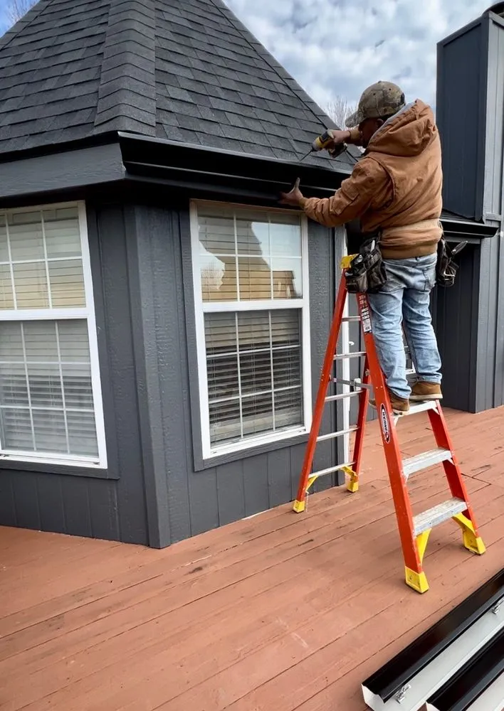 Licensed roof leak repair in Lee's Summit, MO by Integrity Roofing Siding Gutters & Windows
