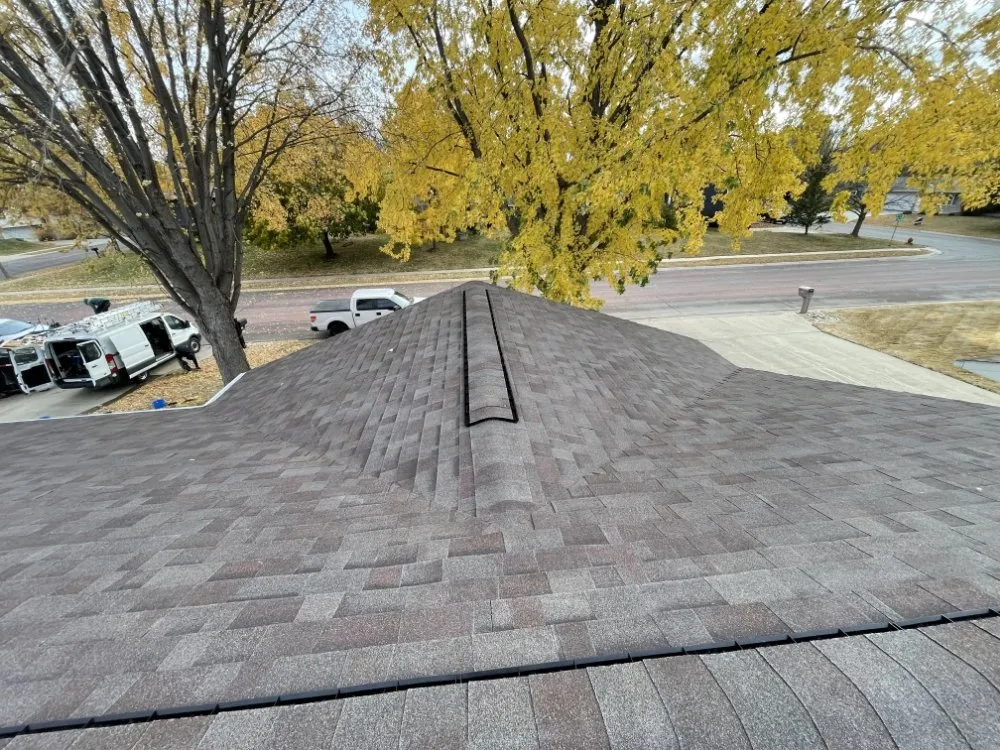 Slide of Intis Roofing