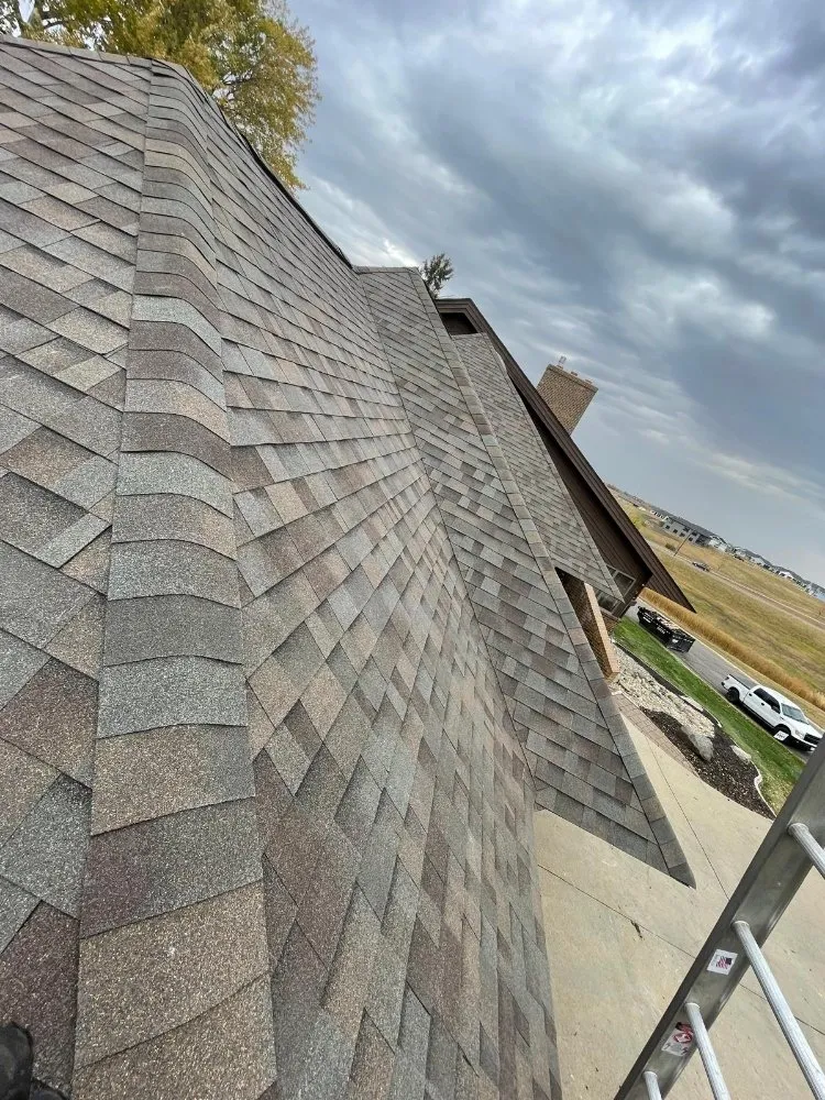 Slide of Intis Roofing