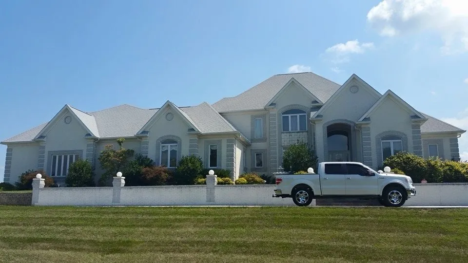 Slide of Invision Roofing