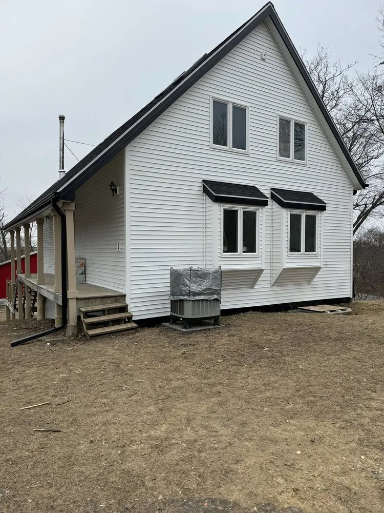 Slide of Iowa Roofing & Exteriors