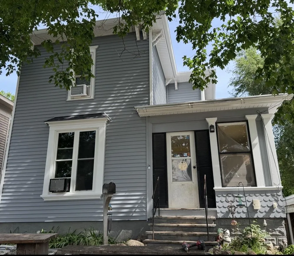 Slide of Iowa Roofing & Exteriors