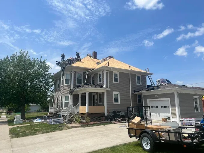 Slide of Iowa Roofing & Exteriors