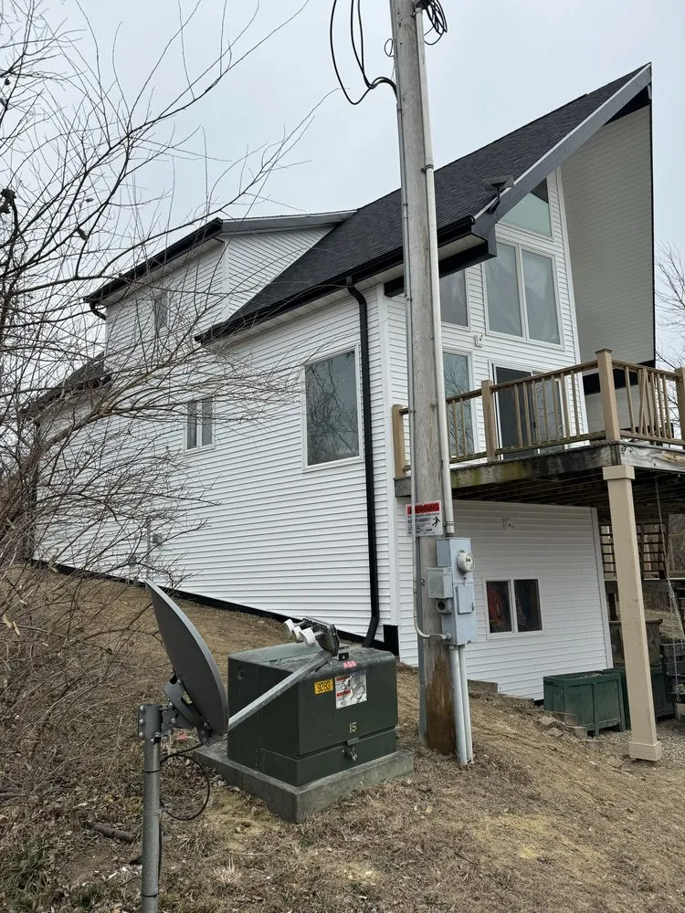 Slide of Iowa Roofing & Exteriors