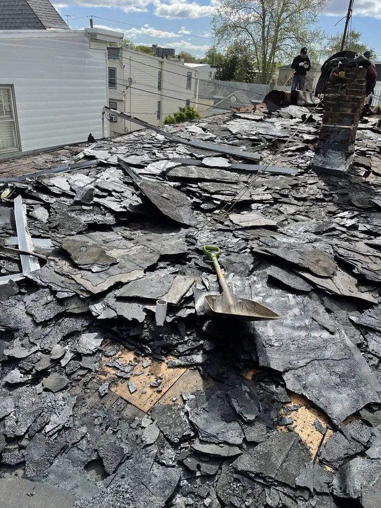 Slide of iPro Roofing & Construction