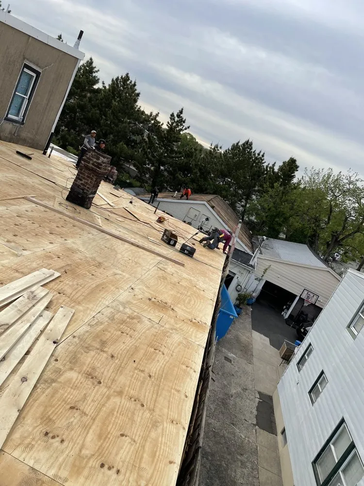 Slide of iPro Roofing & Construction