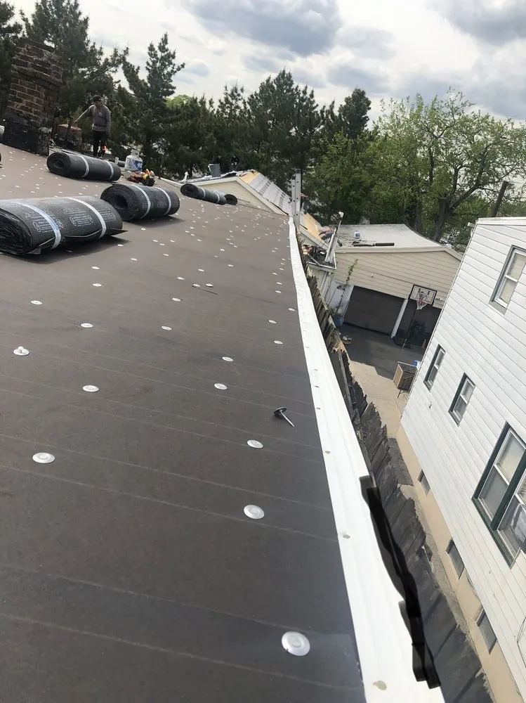 Slide of iPro Roofing & Construction