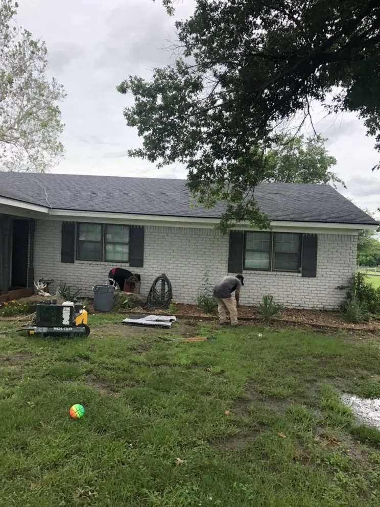 Slide of IQ Roofing & Contracting Inc.