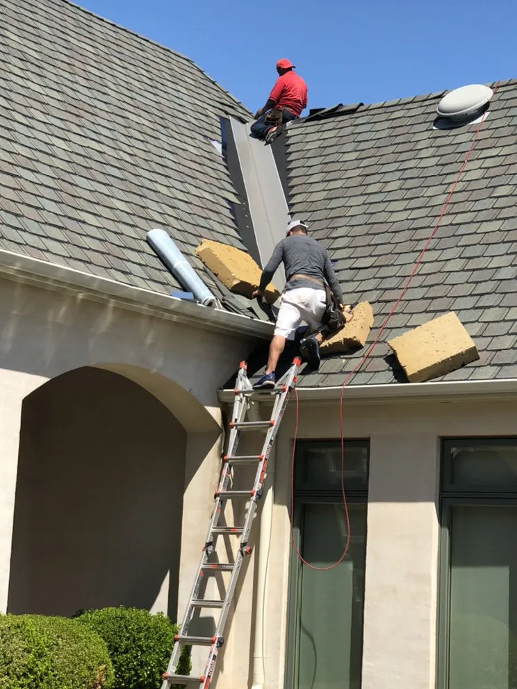 Slide of IQ Roofing & Contracting Inc.