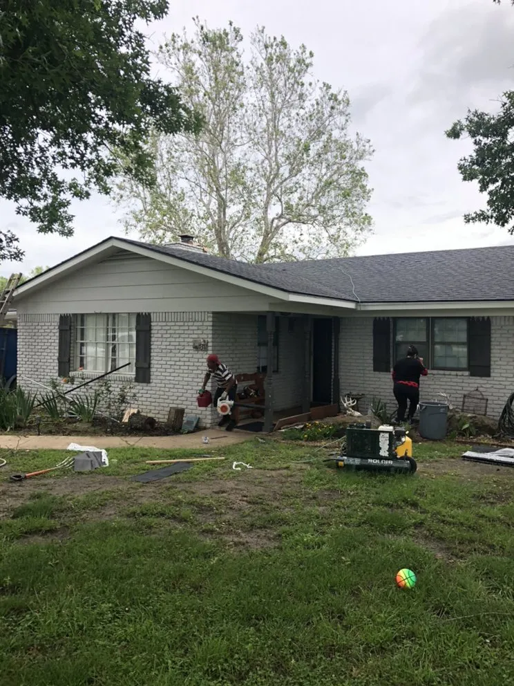 Slide of IQ Roofing & Contracting Inc.