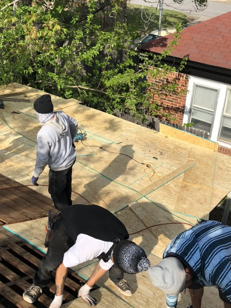 Slide of IQ Roofing & Contracting Inc.