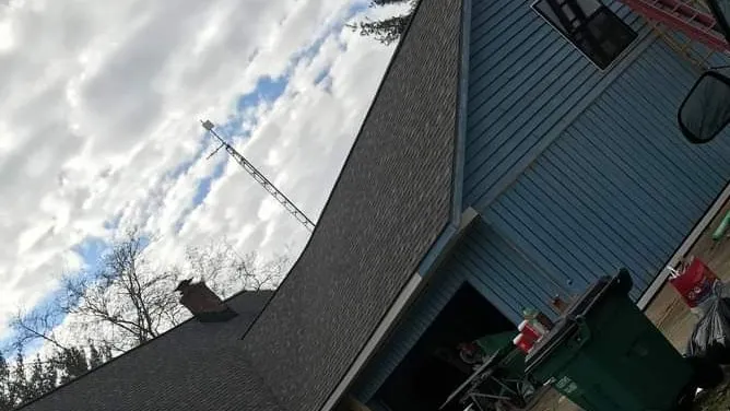 Slide of Ira's Roofing