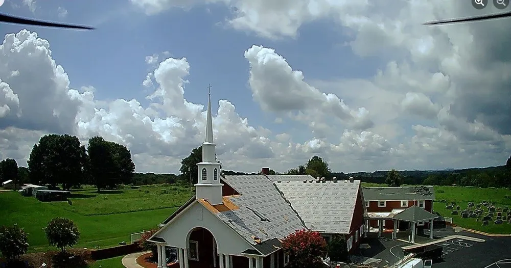 Slide of Iredell Roofing