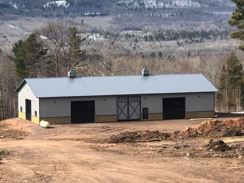 Licensed flat roof repair experts serving Mellen, WI - Iron City Construction
