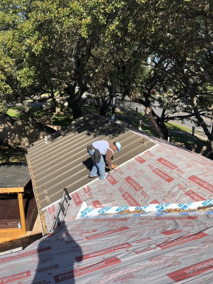 Slide of Iron Clad Roofing and Renovations