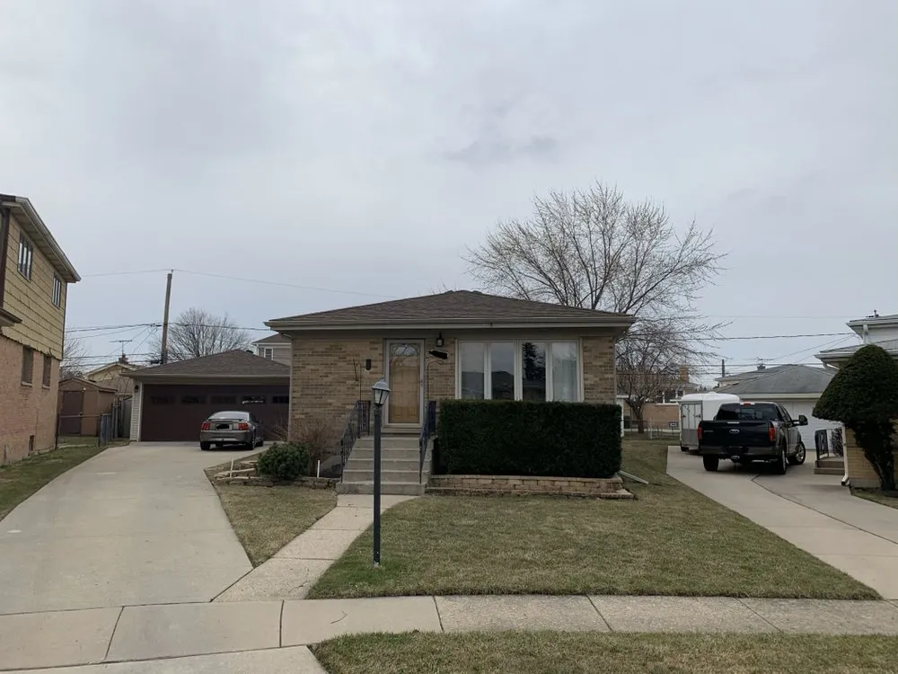 Slide of Iron Guys Roofing and Restoration