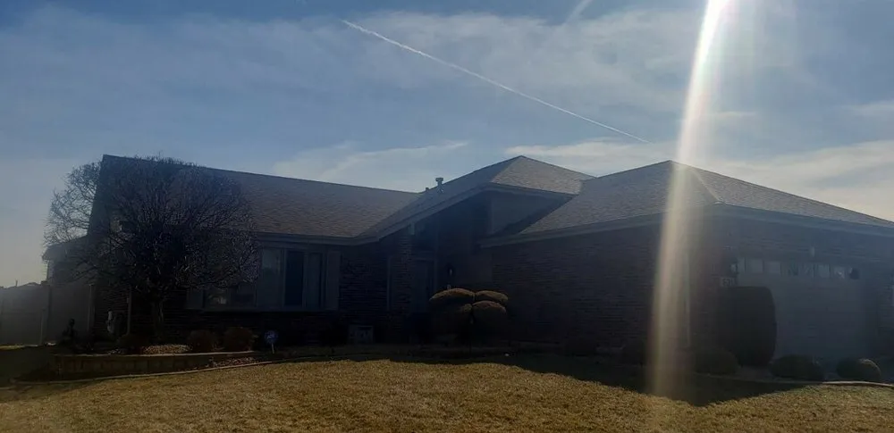 Slide of Iron Guys Roofing and Restoration